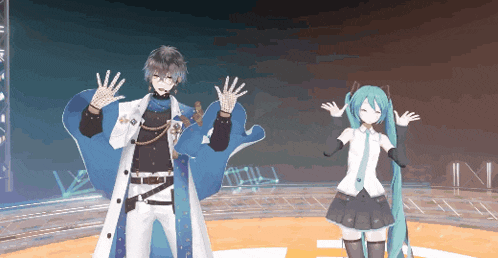a man and a girl are dancing on a stage with their hands up
