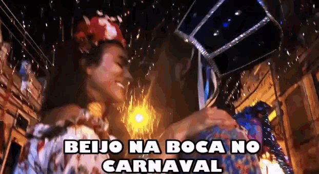 a couple kissing with the words beijo na boca no carnaval