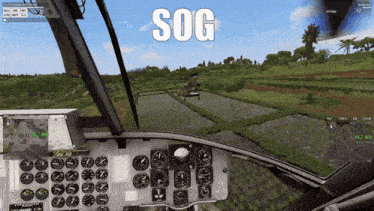 a computer screen shows a helicopter flying over a lush green field and the word sog is on the screen