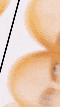 a close up of a person 's face with a clock on it .