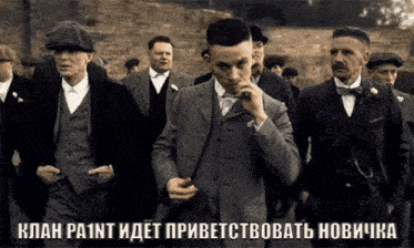 a group of men in suits and hats are walking in a line with a caption in a foreign language
