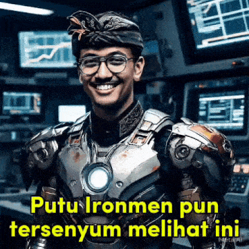 a man in a suit of iron man is smiling in front of a computer screen .
