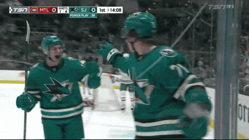 a hockey game is being played on tsn and the sharks are winning