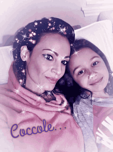 a picture of a woman and a little girl with the word coccole on the bottom right