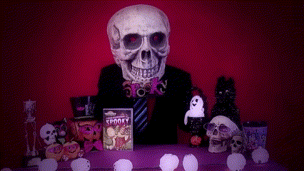 the word spooky is displayed on a shelf with other decorations