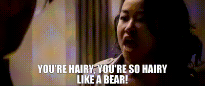a woman is talking to a man and says you 're hairy you 're so hairy like a bear
