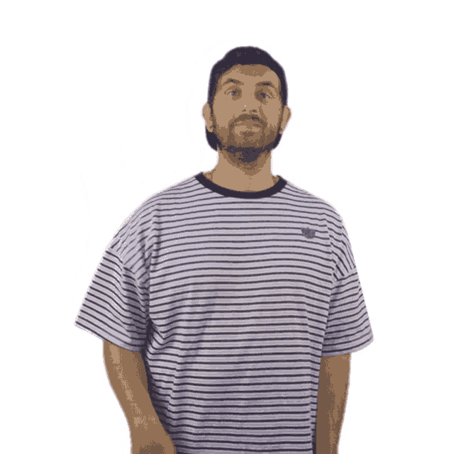a man in a striped shirt is giving a thumbs up sign