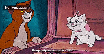 a cartoon cat says everybody wants to be a cat next to a white cat