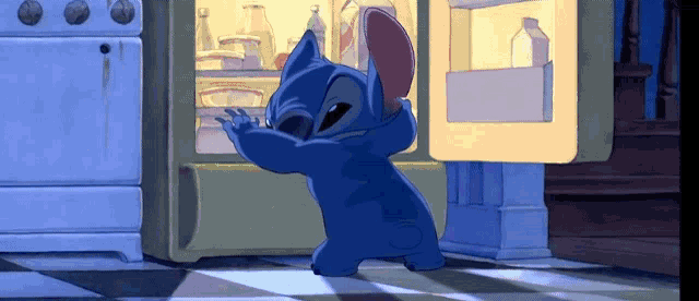 a blue cartoon character is standing in front of a refrigerator