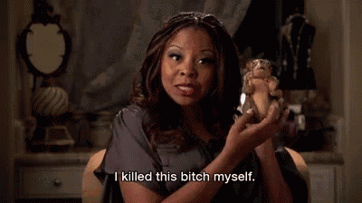 a woman is holding a doll in her hands and saying `` i killed this bitch myself '' .