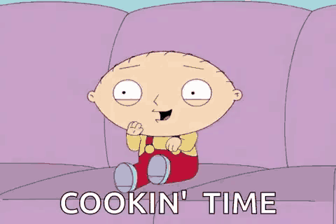 stewie from family guy is sitting on a couch with the words `` cookin ' time '' .