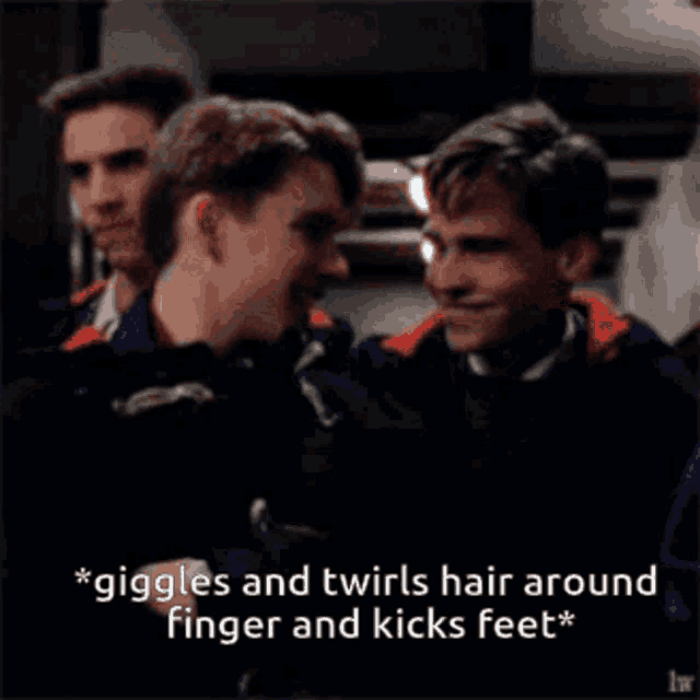 a group of men are laughing and one of them says " giggles and twirls hair around finger and kicks feet