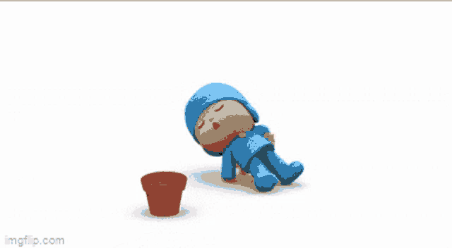 a cartoon character is laying on the ground next to a bowl of food .