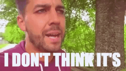 a man with a beard is standing in front of a tree and saying `` i don t think it 's ''