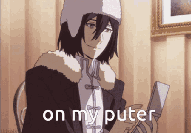 a man in a hat is holding a cell phone with the words " on my puter " below him