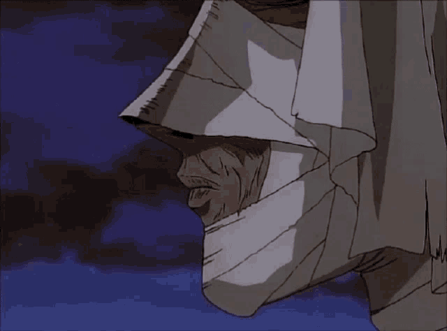 a man with a bandaged face is smoking a cigarette