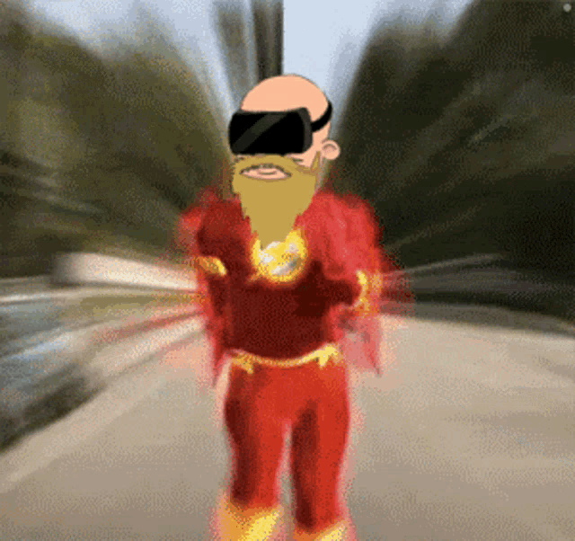 a bald man with a beard wearing a virtual reality headset and a flash costume