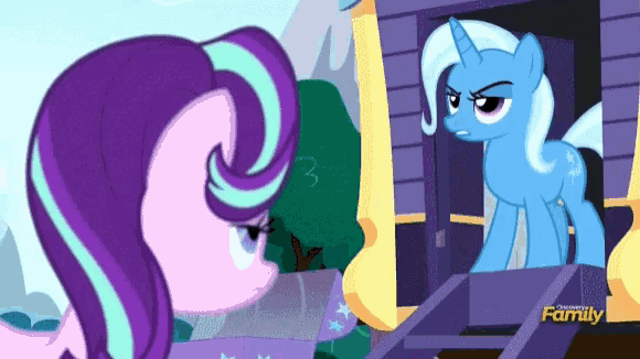 a cartoon of a pony standing next to another pony with the word family on the bottom right