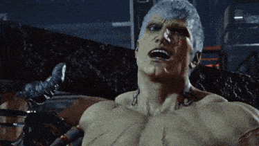 a man with a tattoo on his chest that says s on it