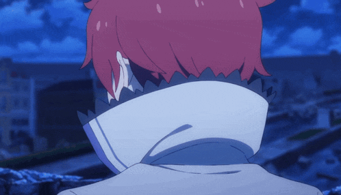 a person with red hair and a white collar