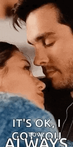 a man and a woman are kissing with the words `` it 's ok , i love you always '' written below them .