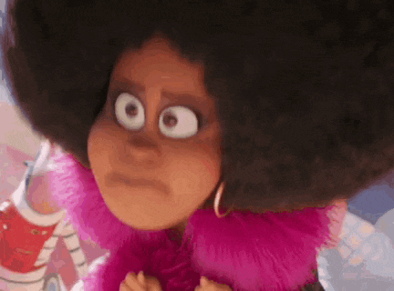 a close up of a cartoon character with big eyes and afro hair .