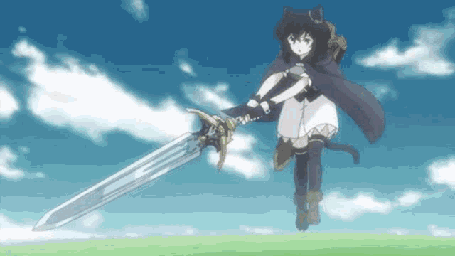 a girl in a cat costume is holding a sword in the air .