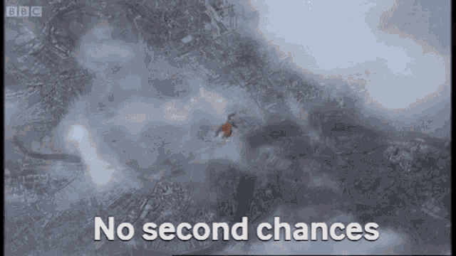 an aerial view of a person flying through the air with the words no second chances written below them .