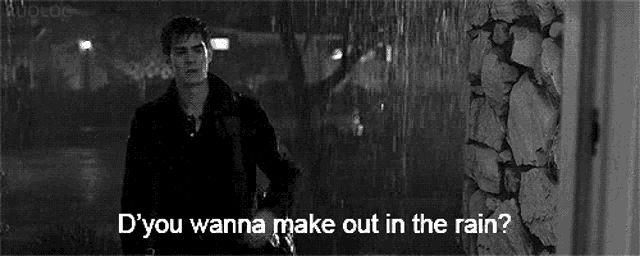 a black and white photo of a man in the rain with the words `` d you wanna make out in the rain ? ''