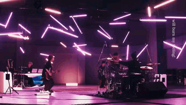 a group of people on a stage with the words will burn my feelings