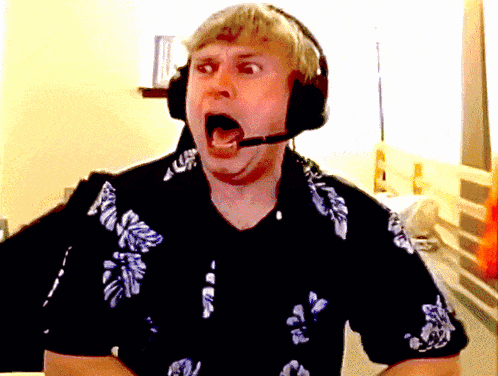 a man wearing headphones and a shirt that says ' hawaiian ' on it