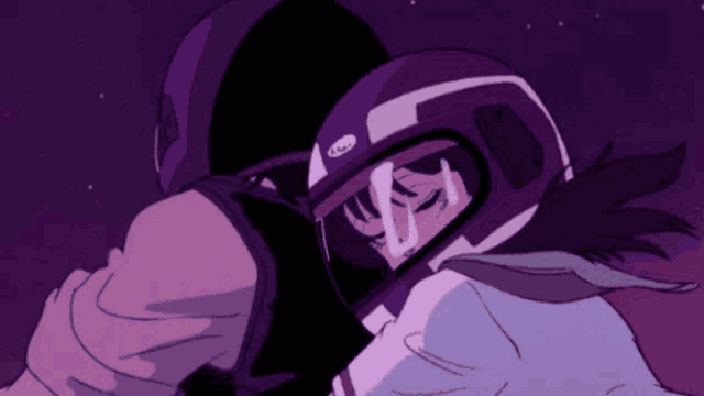 a person wearing a purple helmet that says ' a ' on it