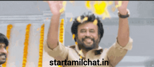 a man with his arms in the air with the words starttamilchat.in written below him