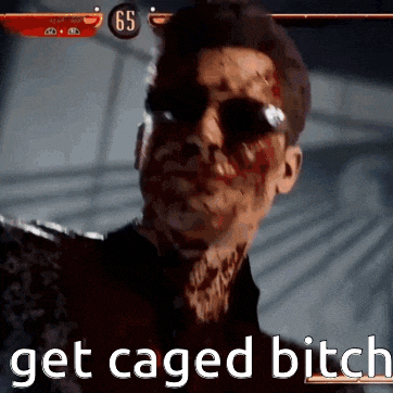 a man with blood on his face and the words get caged bitch below him