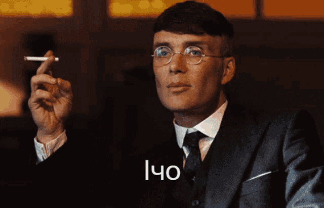 a man in a suit and tie is smoking a cigarette with the word oh written below him