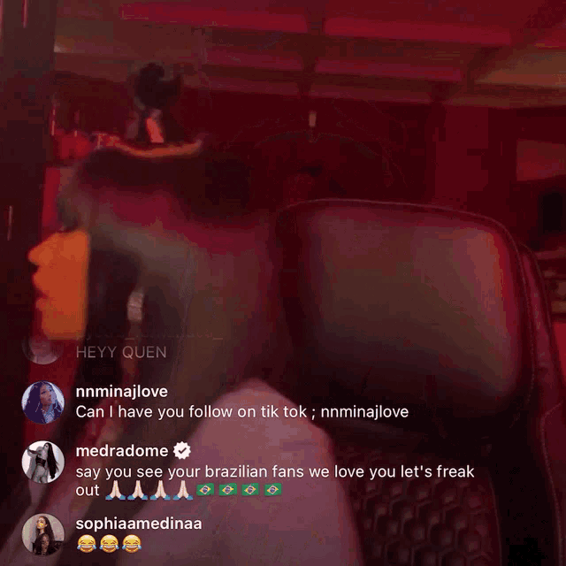 a screenshot of a woman 's face with the words heyy quen on the bottom right