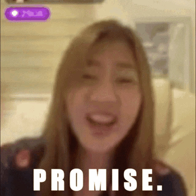 a blurry picture of a woman with the words " promise " written below her