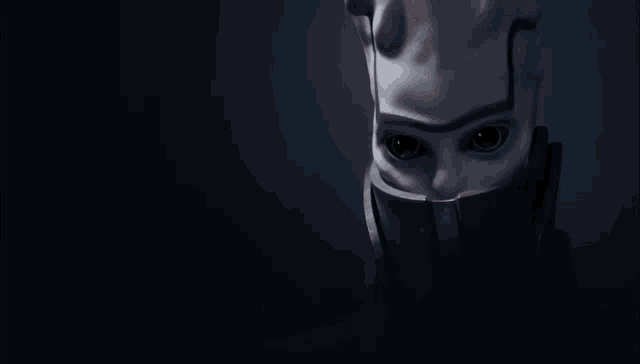 a close up of a person 's face with a mask on