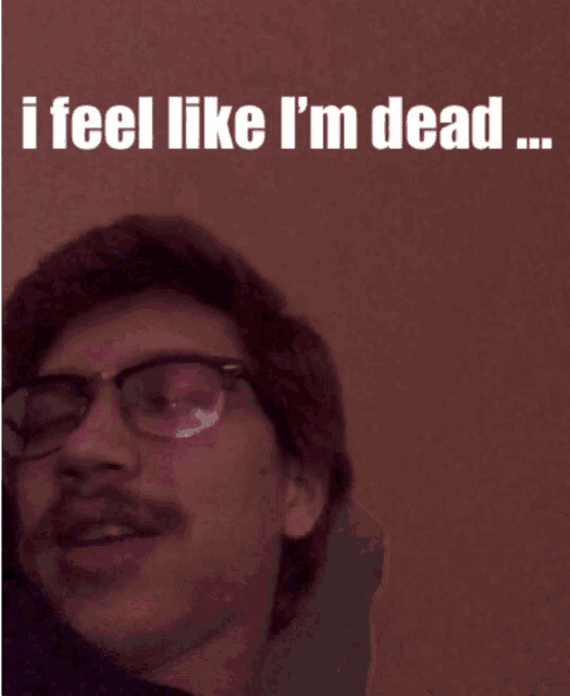 a picture of a man with glasses and the words i 'm alive behind him