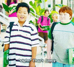 a boy says that 's funny in front of a group of children