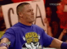 a man is wearing a blue shirt that says never give up