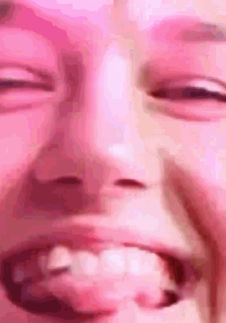 a close up of a person 's face with pink lips