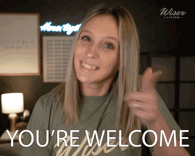 a woman giving a thumbs up with the words " you 're welcome " below her