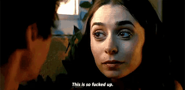 a woman is talking to a man and says `` this is so fucked up . ''