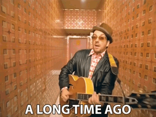 A Long Time Ago Playing Guitar GIF - A Long Time Ago Playing Guitar Musician GIFs