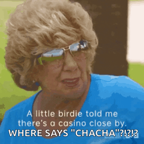 a woman wearing sunglasses and a blue shirt says a little birdie