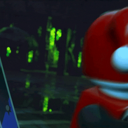 a lego harley quinn character with a red jacket