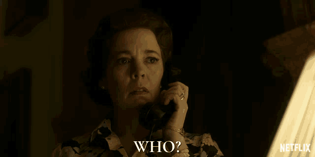 a woman is talking on a phone and the words who are visible