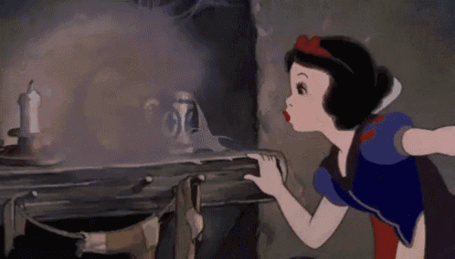 snow white from snow white and the seven dwarfs is looking at a ghost behind a table .