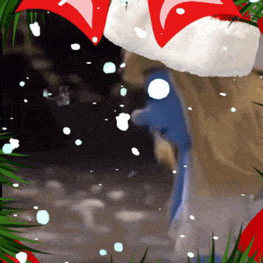 a christmas decoration with a santa hat and snow falling